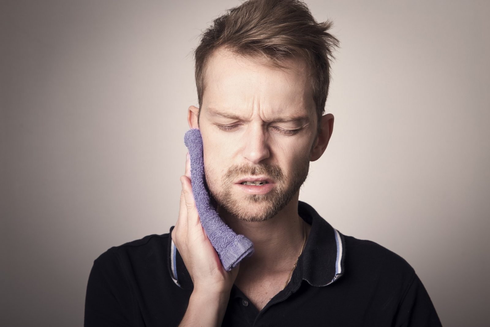 Man in Discomfort of TMJ